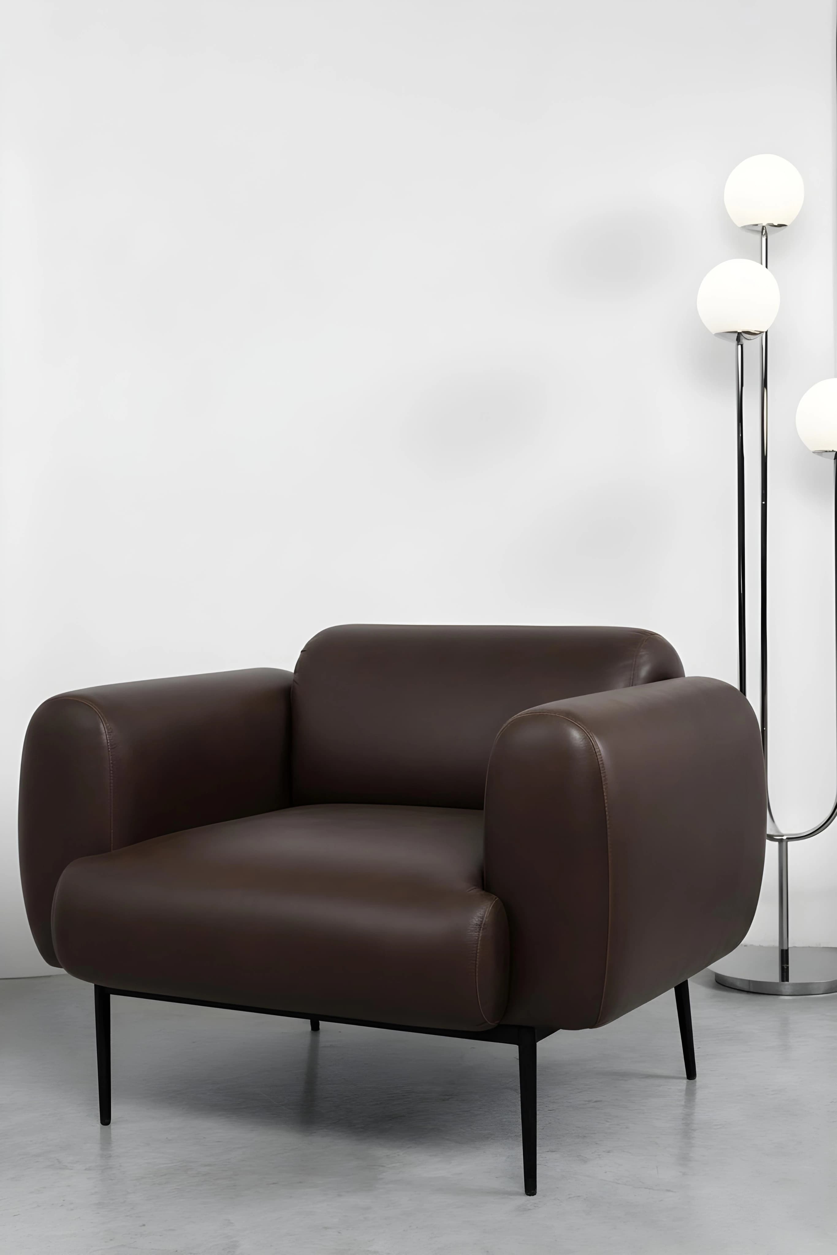 Halo — Lounge Chair · 2026, Bronzed ash, full-grain leather.